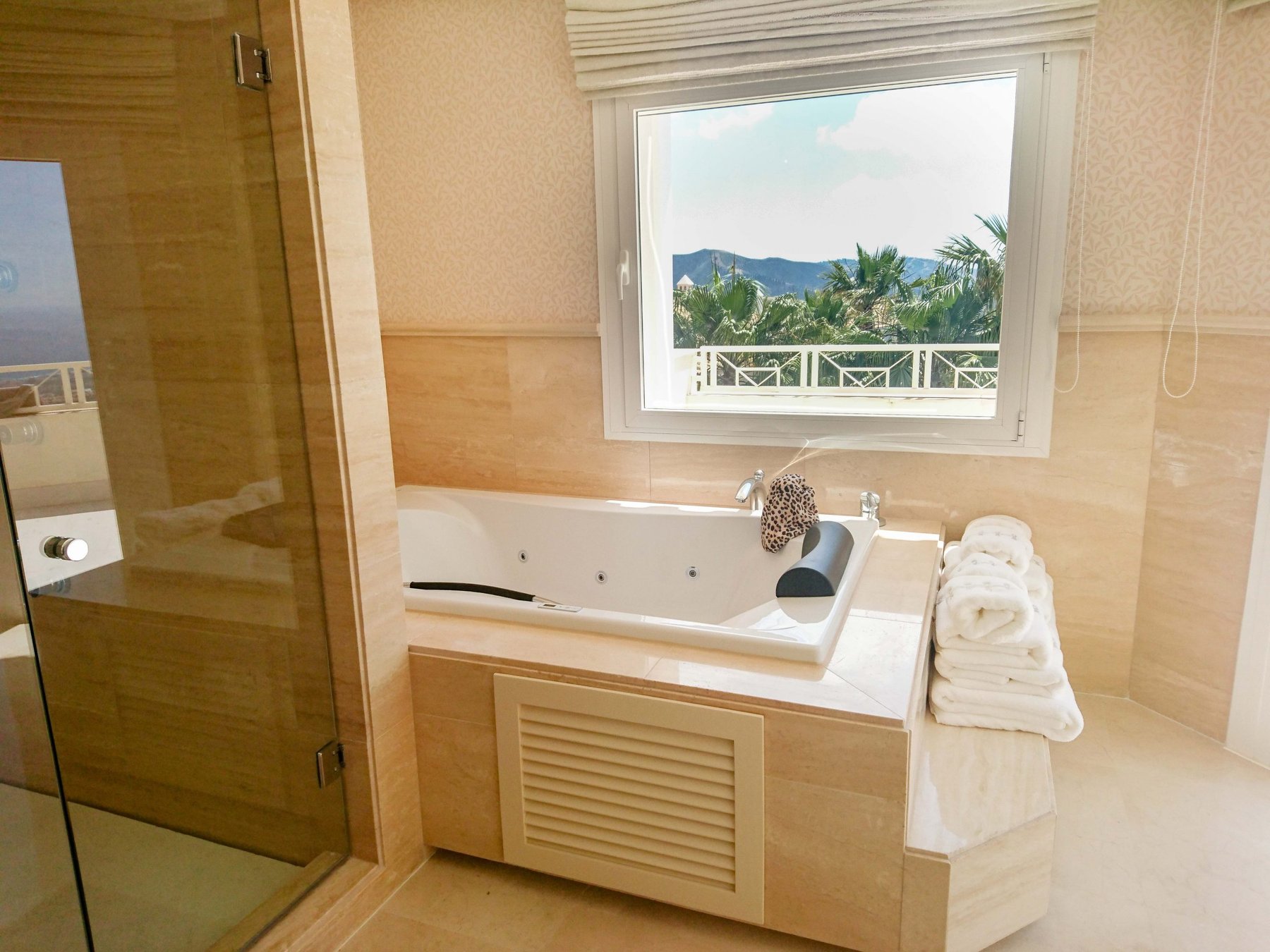 Marble bathroom with Jacuzzi and mountain view