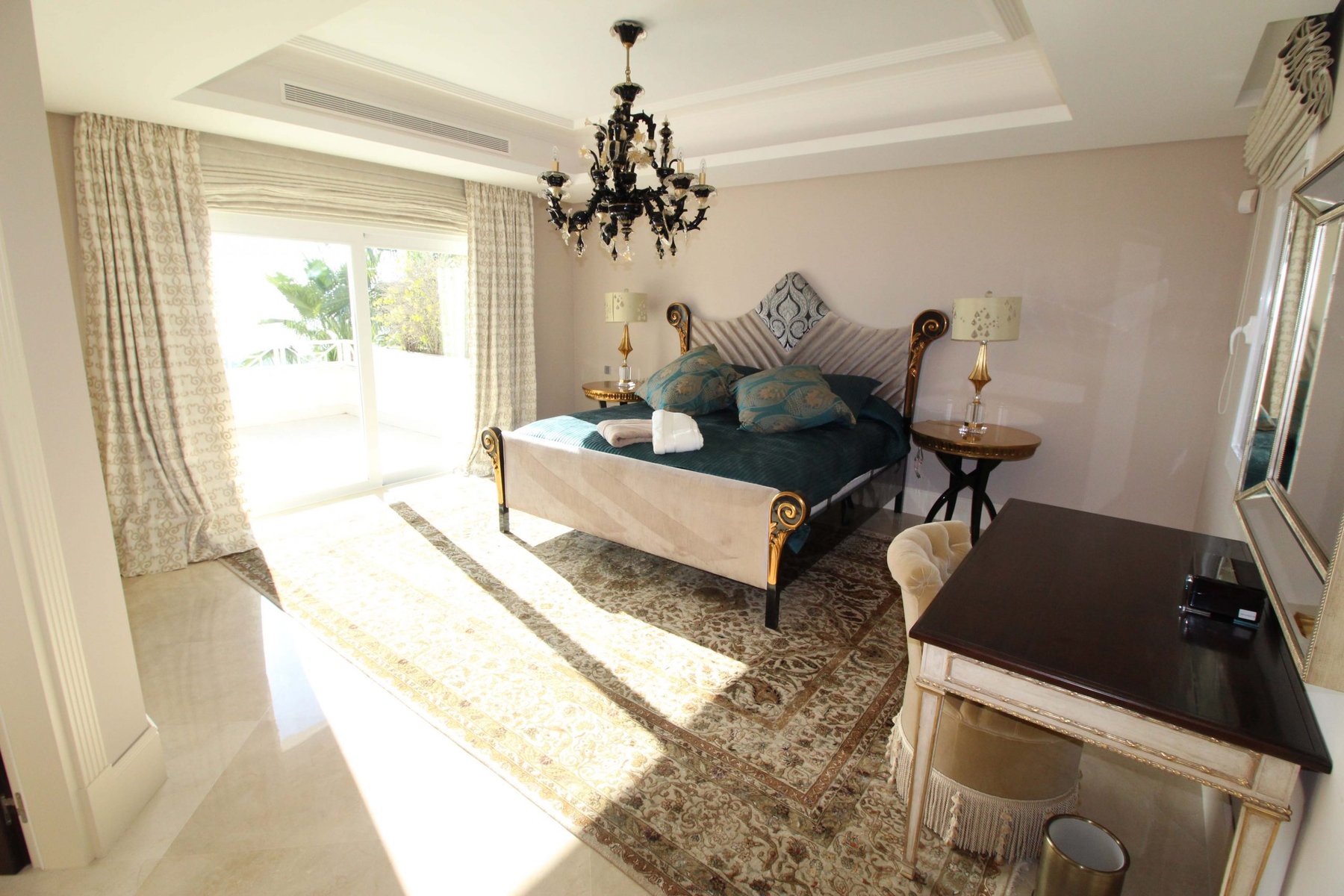 Luxury double bedroom suite with private terrace access