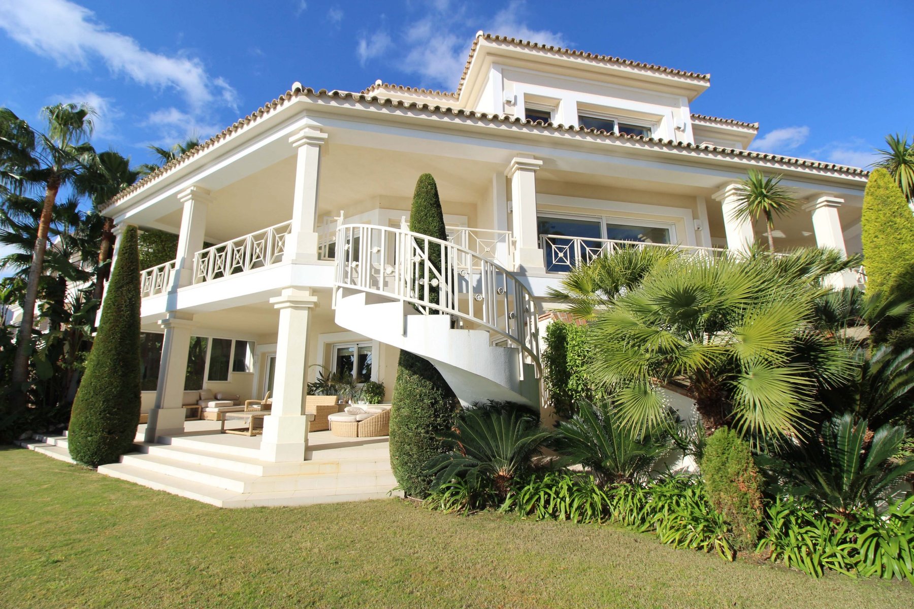 Three-level Marbella villa surrounded by landscaped Mediterranean gardens
